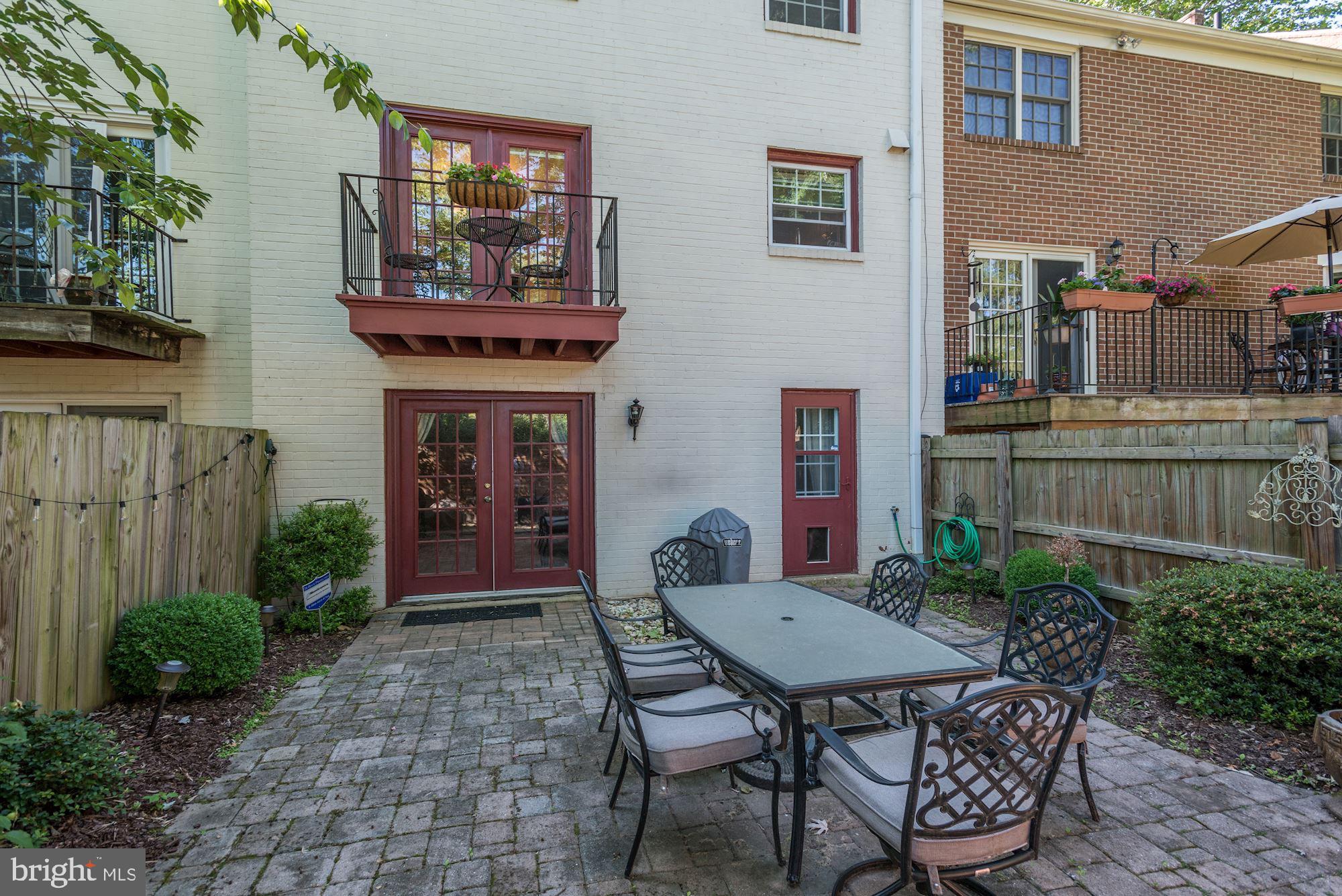 1851 Wainwright Drive Reston, VA 20190 - Photo 25 of 26 a view of a dinning table and chairs in the patio