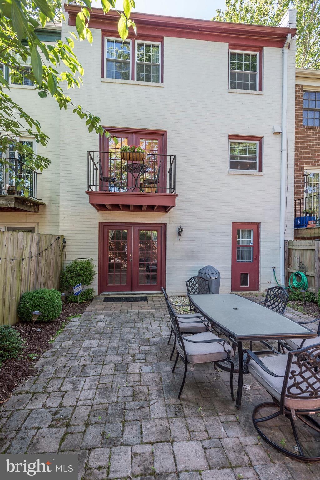 1851 Wainwright Drive Reston, VA 20190 - Photo 26 of 26 a living room with furniture and a fireplace