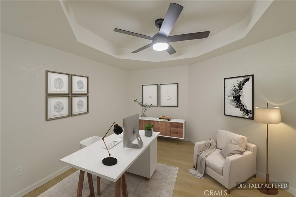 18515 Kalin Ranch Drive Victorville, CA 92395 - Photo 11 of 33 a living room with furniture and a wooden floor