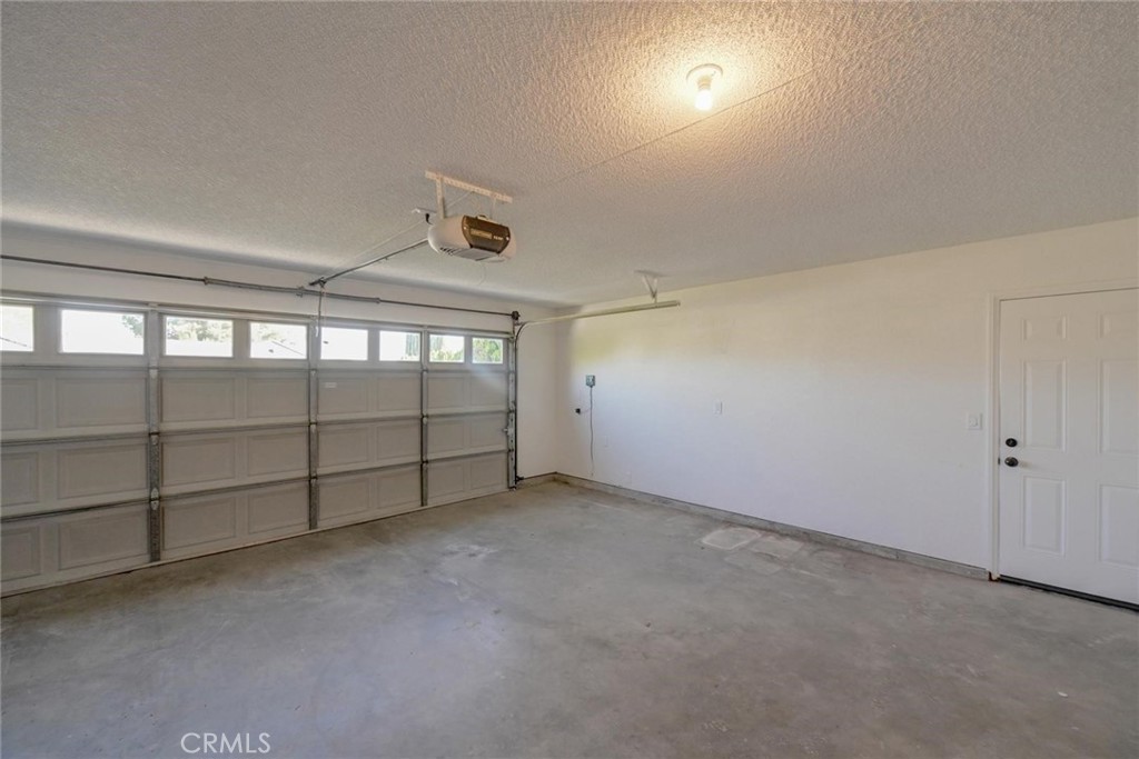 18515 Kalin Ranch Drive Victorville, CA 92395 - Photo 25 of 33 a view of an empty garage
