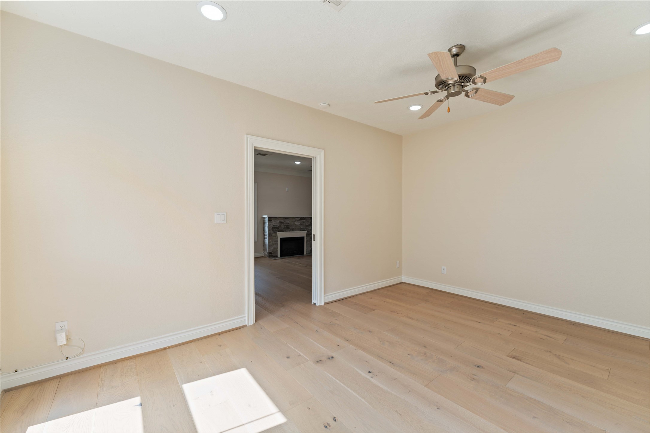 2631 Persa Street Houston, TX 77098 - Photo 15 of 25 wooden floor in an empty room