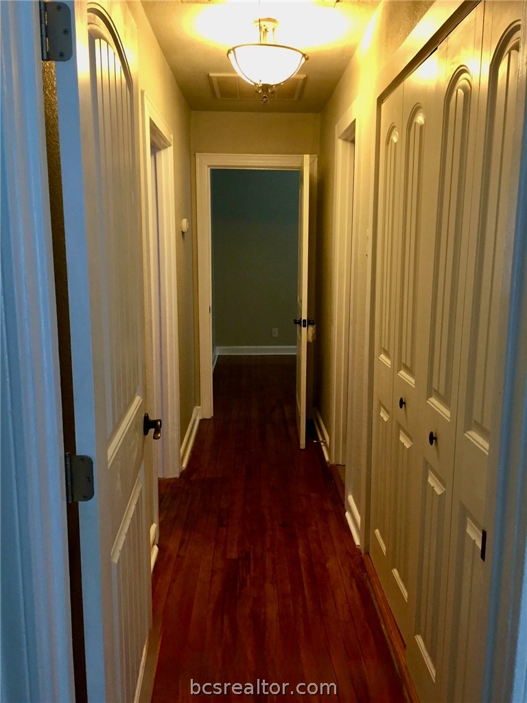 800 Mitchell Street Bryan, TX 77802 - Photo 5 of 6 Hallway to bedrooms