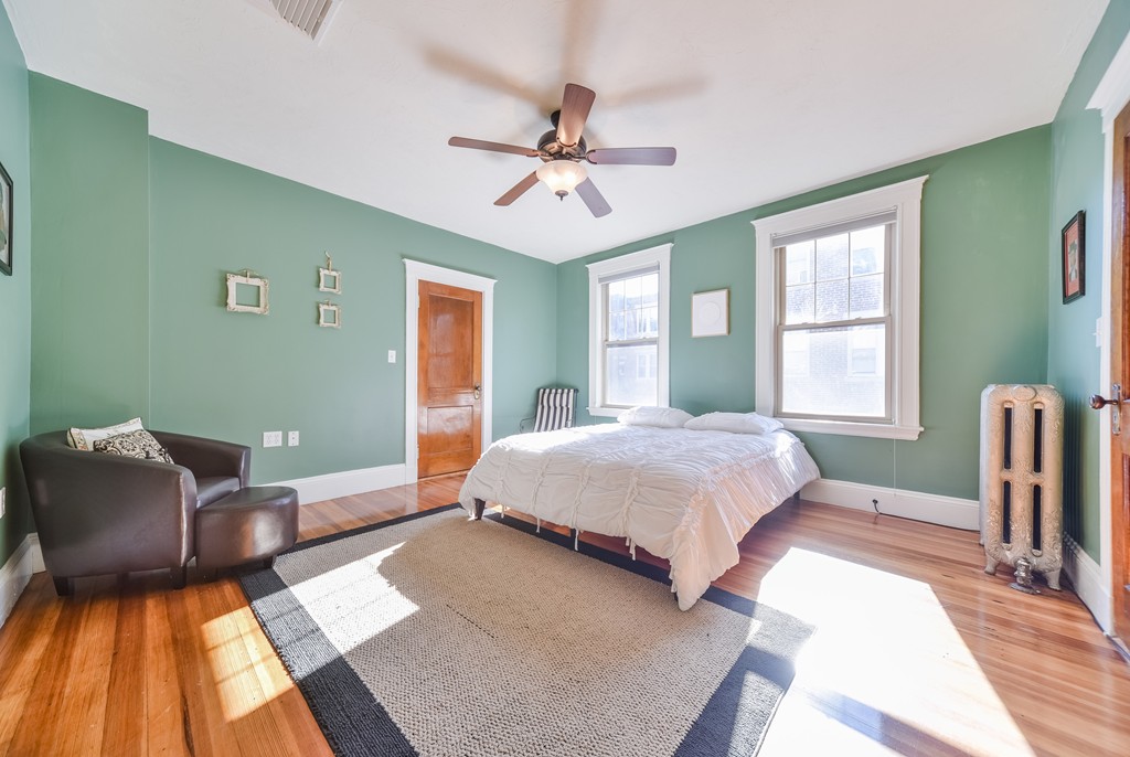 99 Parkton Road, Unit 2 Boston, MA 02130 - Photo 11 of 19 a spacious bedroom with a bed and window