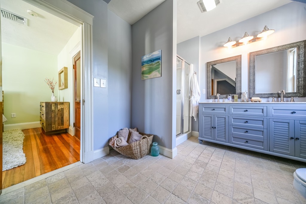 99 Parkton Road, Unit 2 Boston, MA 02130 - Photo 16 of 19 a bedroom with a bed and a bathroom