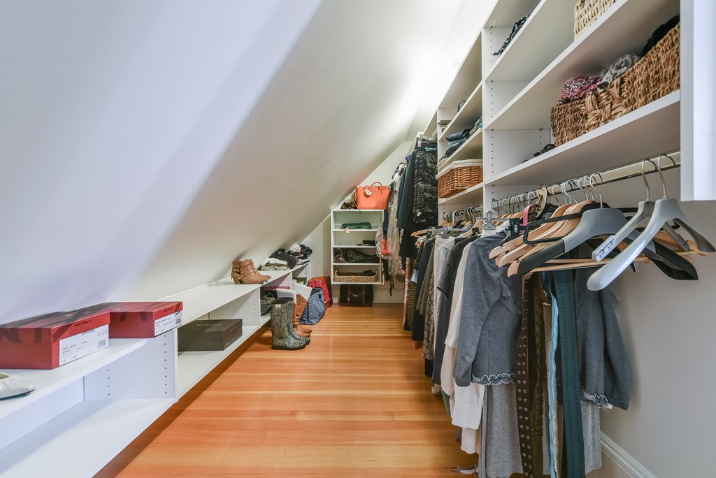 99 Parkton Road, Unit 2 Boston, MA 02130 - Photo 17 of 19 a view of walk in closet with clothes and shoes