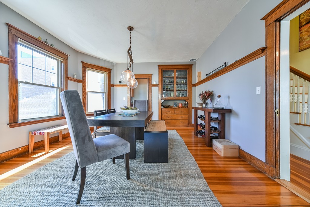 99 Parkton Road, Unit 2 Boston, MA 02130 - Photo 5 of 19 a dining room with furniture and wooden floor