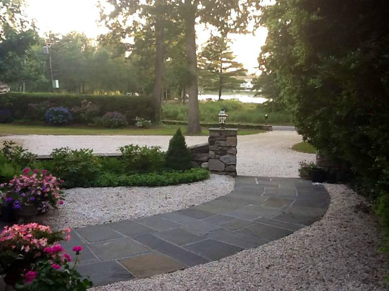9 Contentment Island Road Darien, CT 06820 - Photo 12 of 38 a view of a garden with a fountain