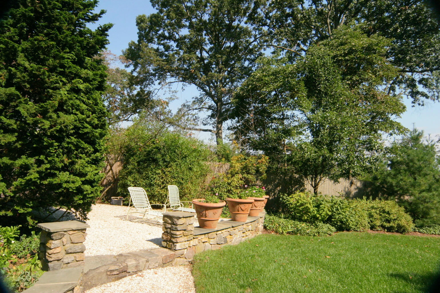 9 Contentment Island Road Darien, CT 06820 - Photo 13 of 38 a view of a backyard with sitting area