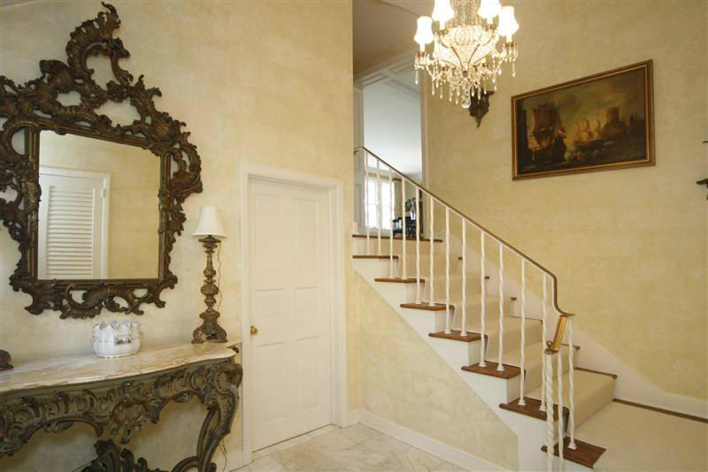 9 Contentment Island Road Darien, CT 06820 - Photo 18 of 38 a bath room with a chandelier