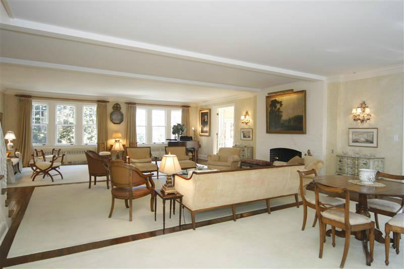 9 Contentment Island Road Darien, CT 06820 - Photo 20 of 38 a living room with fireplace furniture and a large window