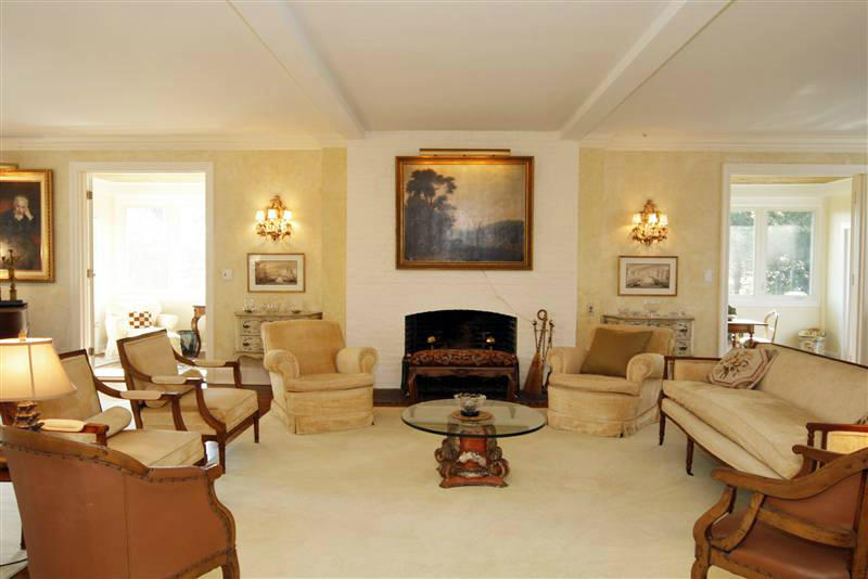 9 Contentment Island Road Darien, CT 06820 - Photo 21 of 38 a living room with furniture and a fireplace