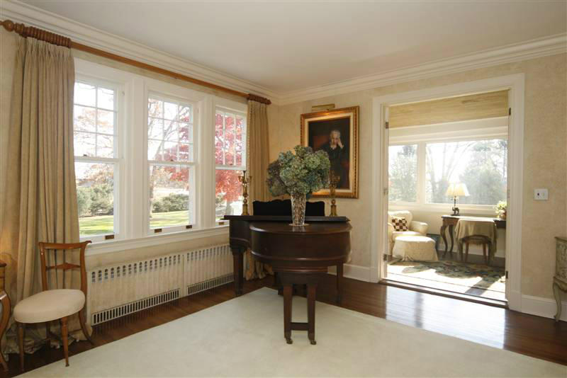 9 Contentment Island Road Darien, CT 06820 - Photo 22 of 38 a living room with furniture and a floor to ceiling window
