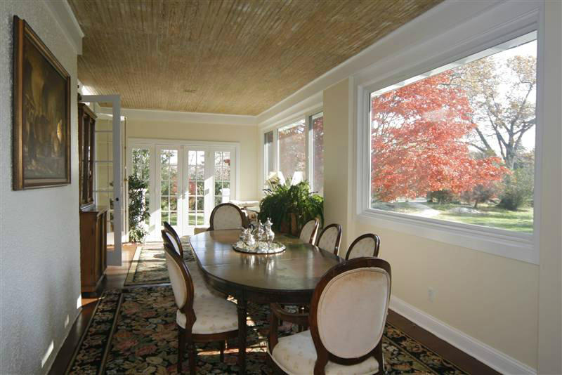 9 Contentment Island Road Darien, CT 06820 - Photo 24 of 38 a dining room with furniture window and wooden floor
