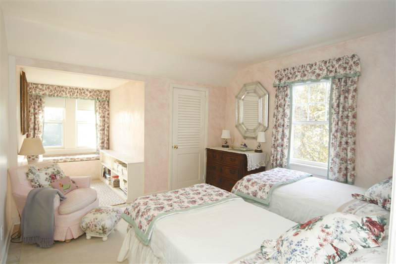 9 Contentment Island Road Darien, CT 06820 - Photo 34 of 38 a bedroom with bed and window