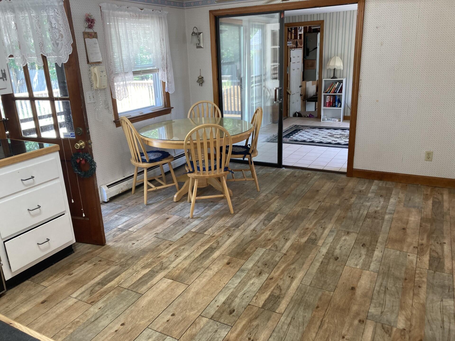 45 Blue Jay Drive Hyannis, MA 02601 - Photo 16 of 18 a view of a livingroom with furniture and window