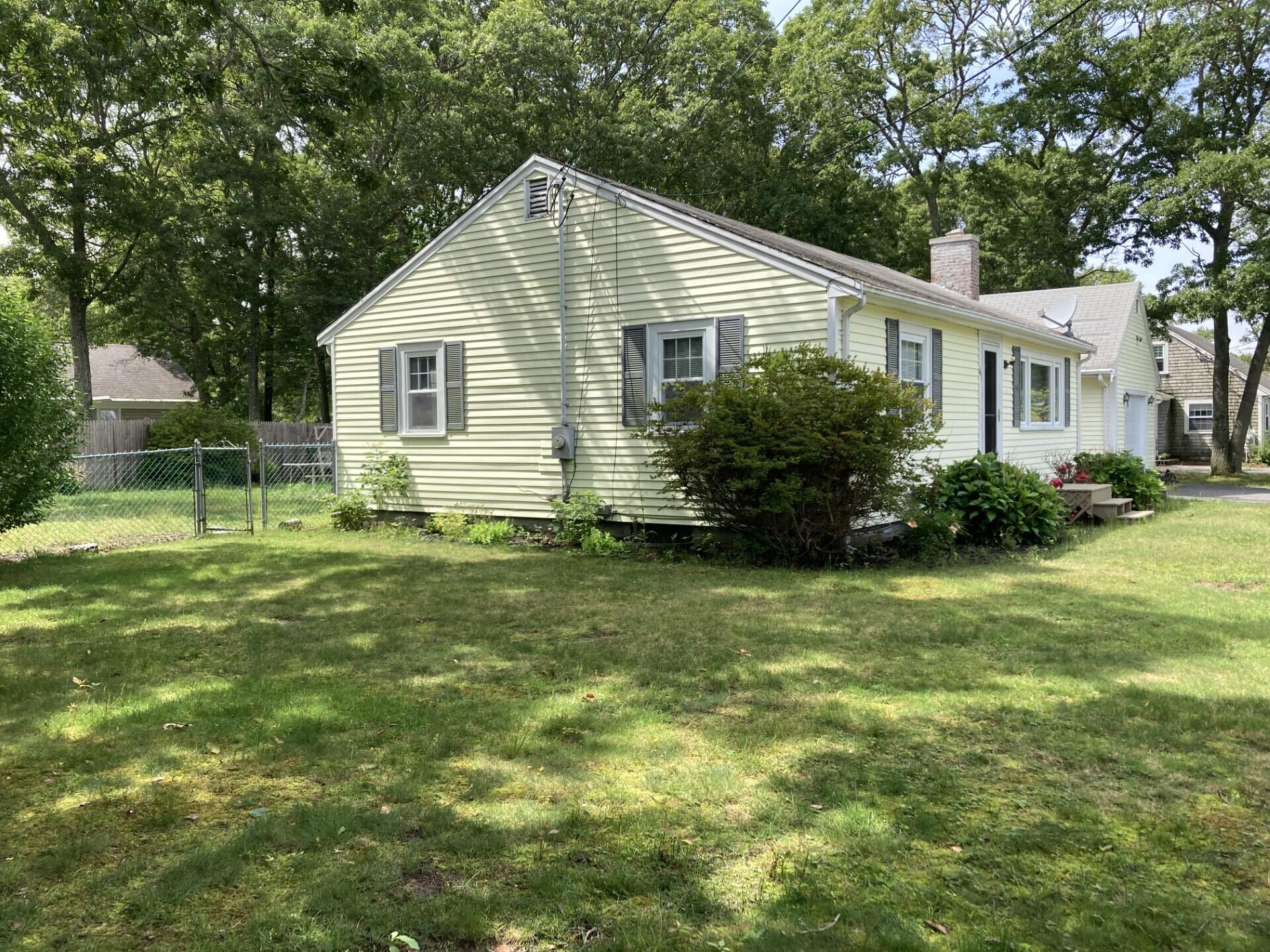 45 Blue Jay Drive Hyannis, MA 02601 - Photo 4 of 18 a view of a house with a yard