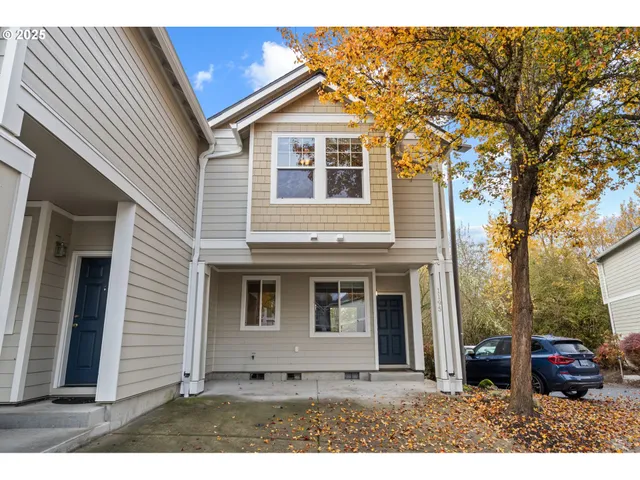 a view of a yard in front of a house