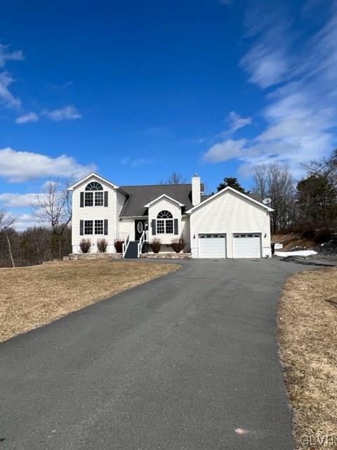 1095 Clover Road South Long Pond, PA 18334 - Photo 1 of 27 a house with a outdoor space
