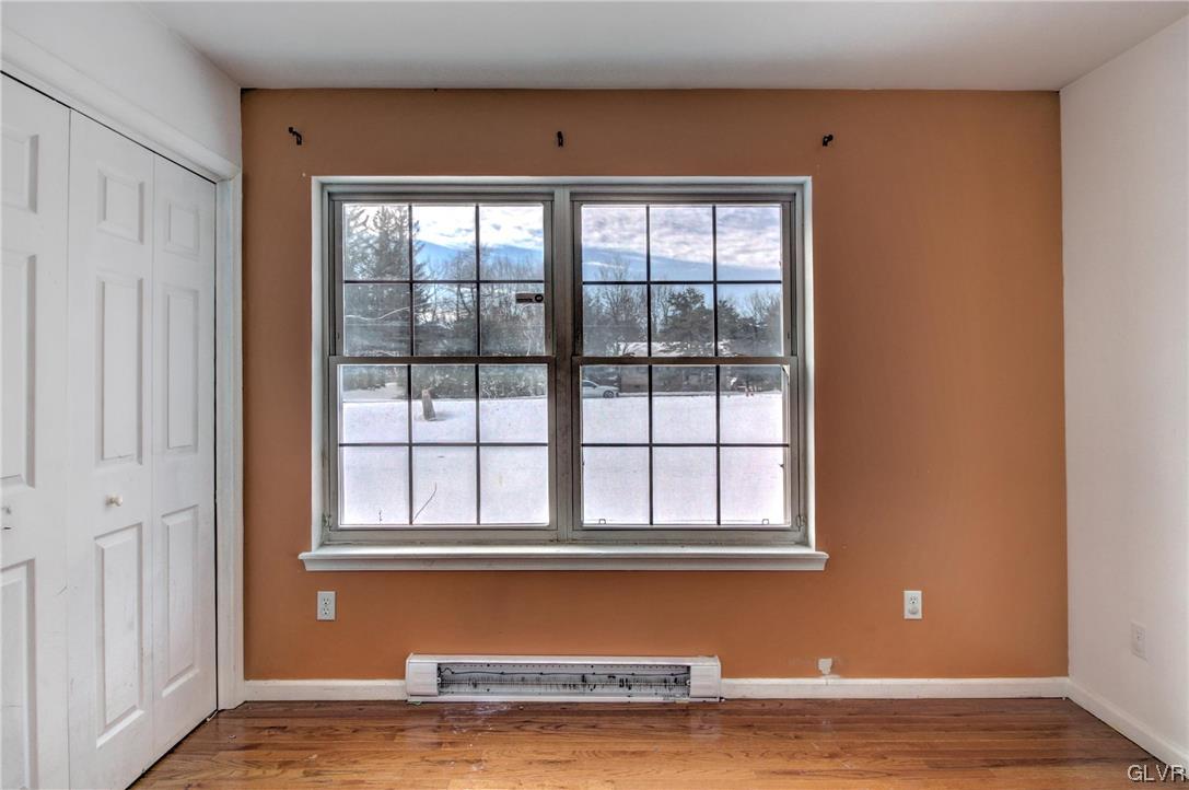 1095 Clover Road South Long Pond, PA 18334 - Photo 14 of 27 a view of a livingroom with an empty space and window