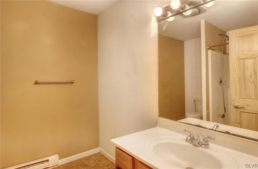 1095 Clover Road South Long Pond, PA 18334 - Photo 20 of 27 a bathroom with a sink and a mirror