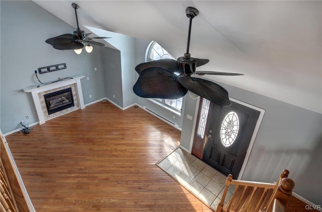 1095 Clover Road South Long Pond, PA 18334 - Photo 21 of 27 a view of a livingroom with furniture chandelier