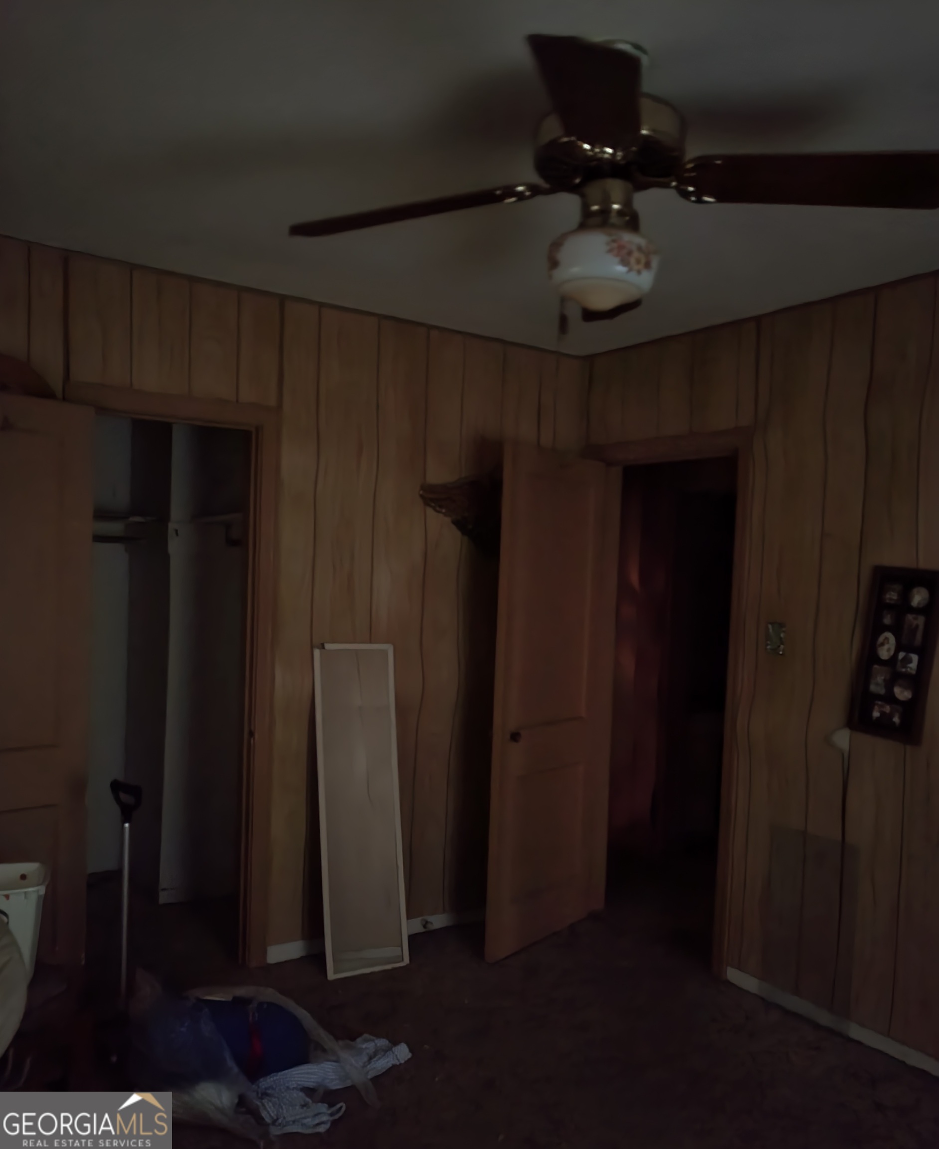 205 Collins Street Albany, GA 31705 - Photo 7 of 14 a room with furniture and wooden floor