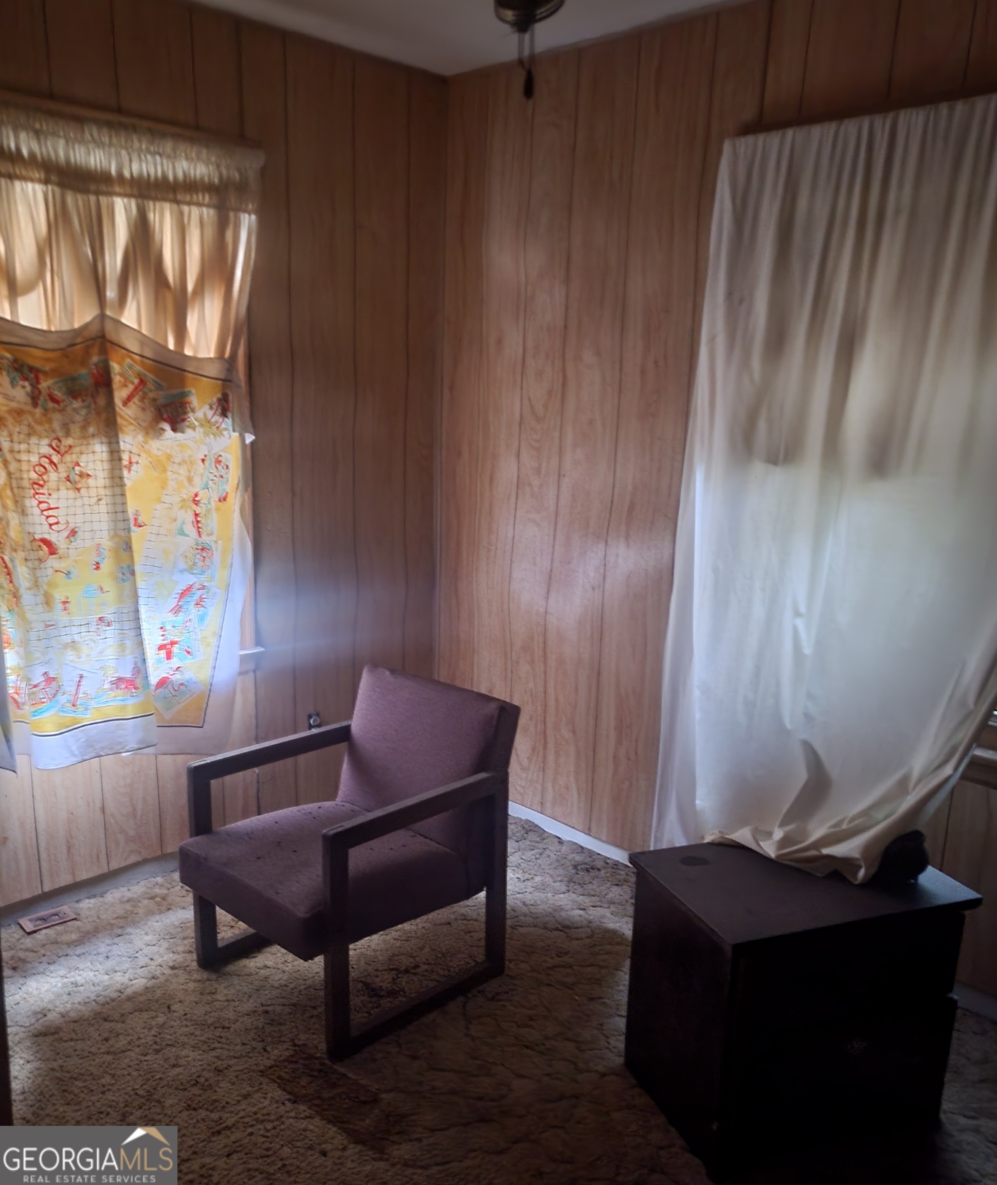 205 Collins Street Albany, GA 31705 - Photo 10 of 14 a living room with furniture and a window