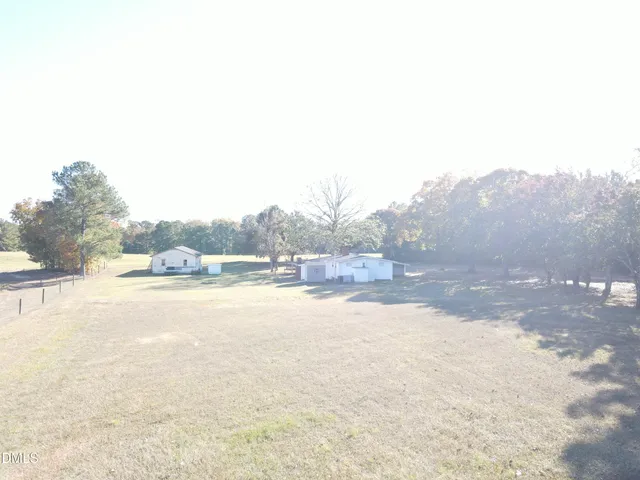 a view of a town with mountains in the background