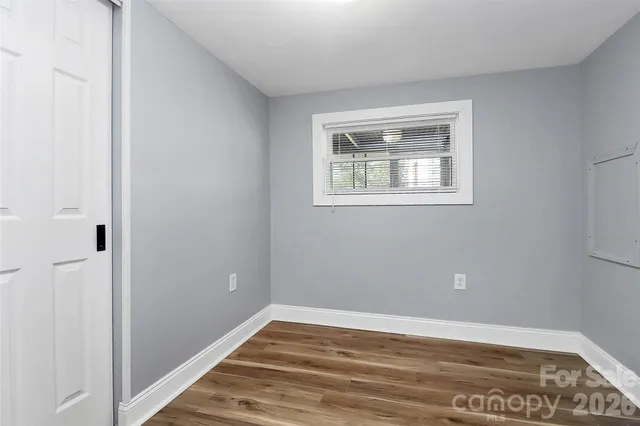 a view of entryway with wooden floor