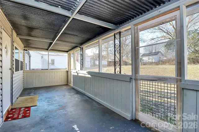 a backyard of a house with outdoor seating