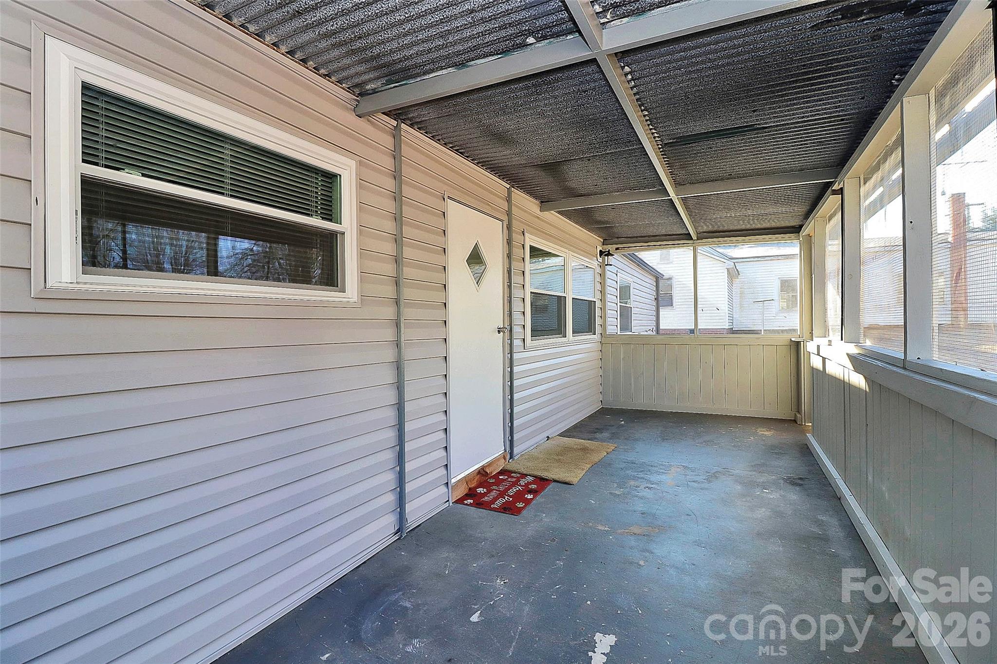 146 Swink Street Southwest Concord, NC 28027 - Photo 25 of 35 a backyard of a house with outdoor seating