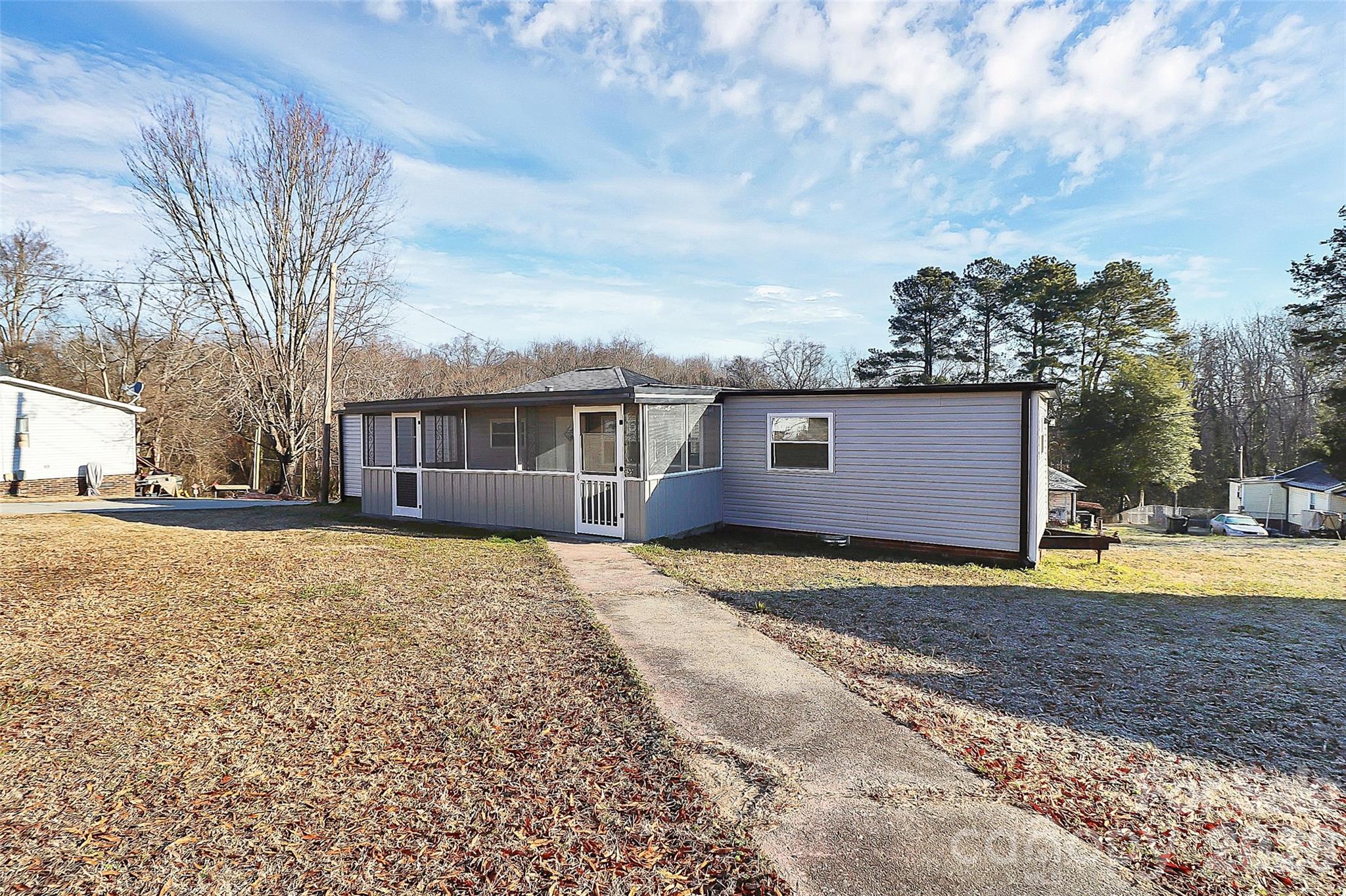 146 Swink Street Southwest Concord, NC 28027 - Photo 26 of 35 a view of a yard in front of a house with a yard