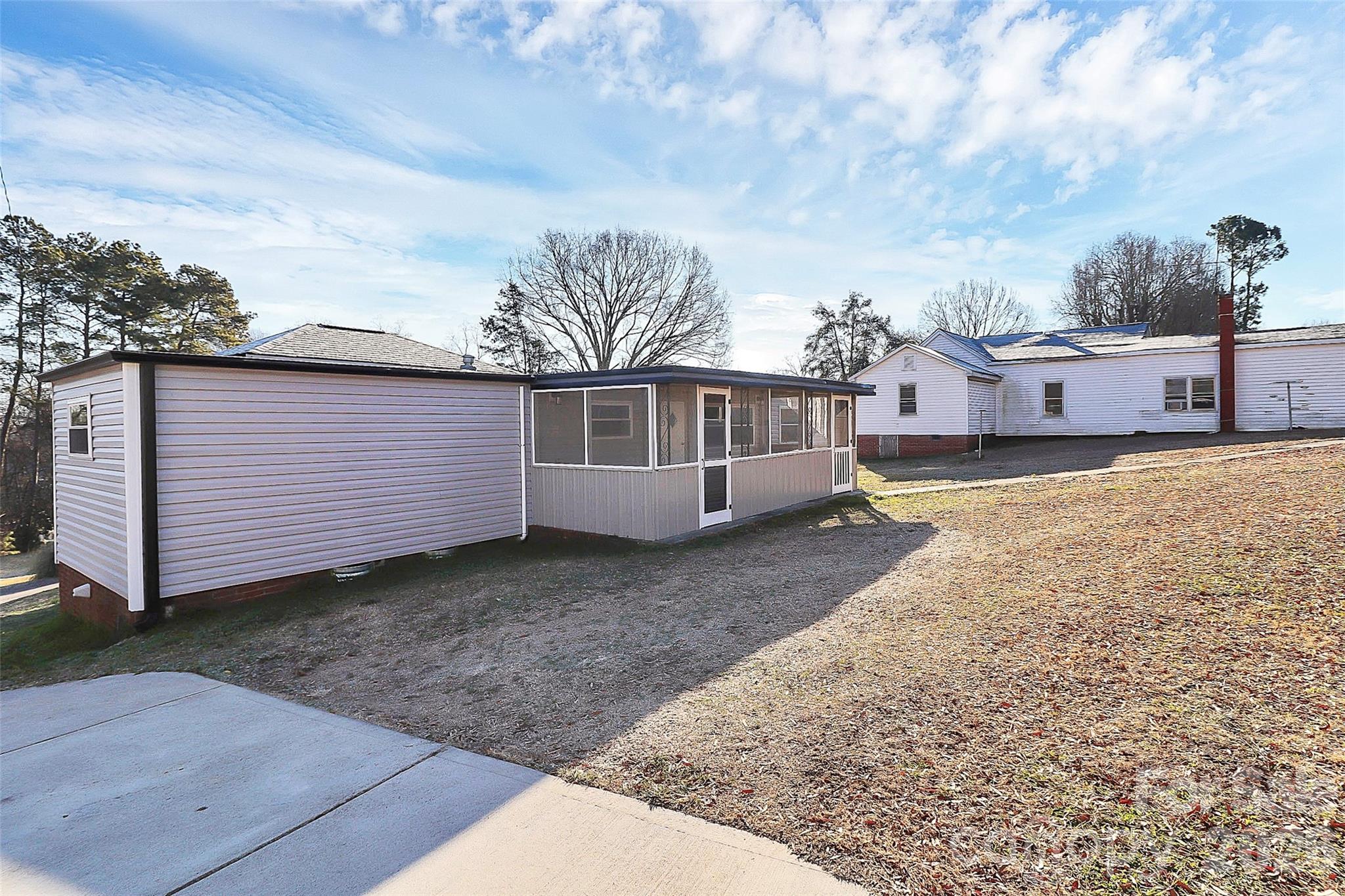 146 Swink Street Southwest Concord, NC 28027 - Photo 27 of 35 a view of a house with a yard