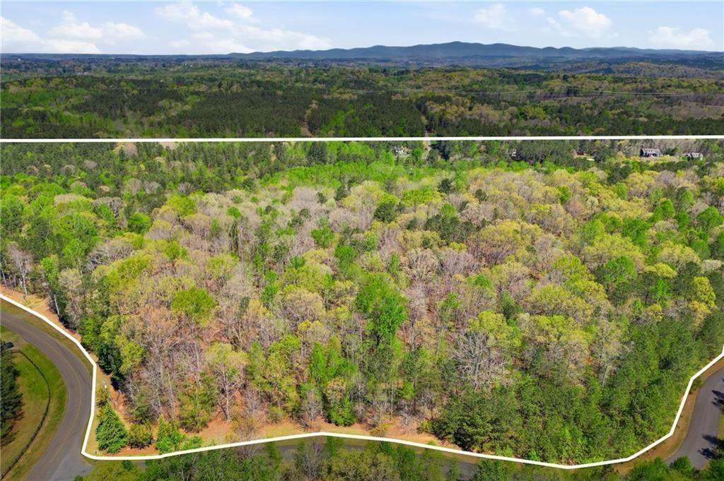 3102 Flatbottom Road Ball Ground, GA 30107 - Photo 14 of 15 a view of a yard with wooden fence