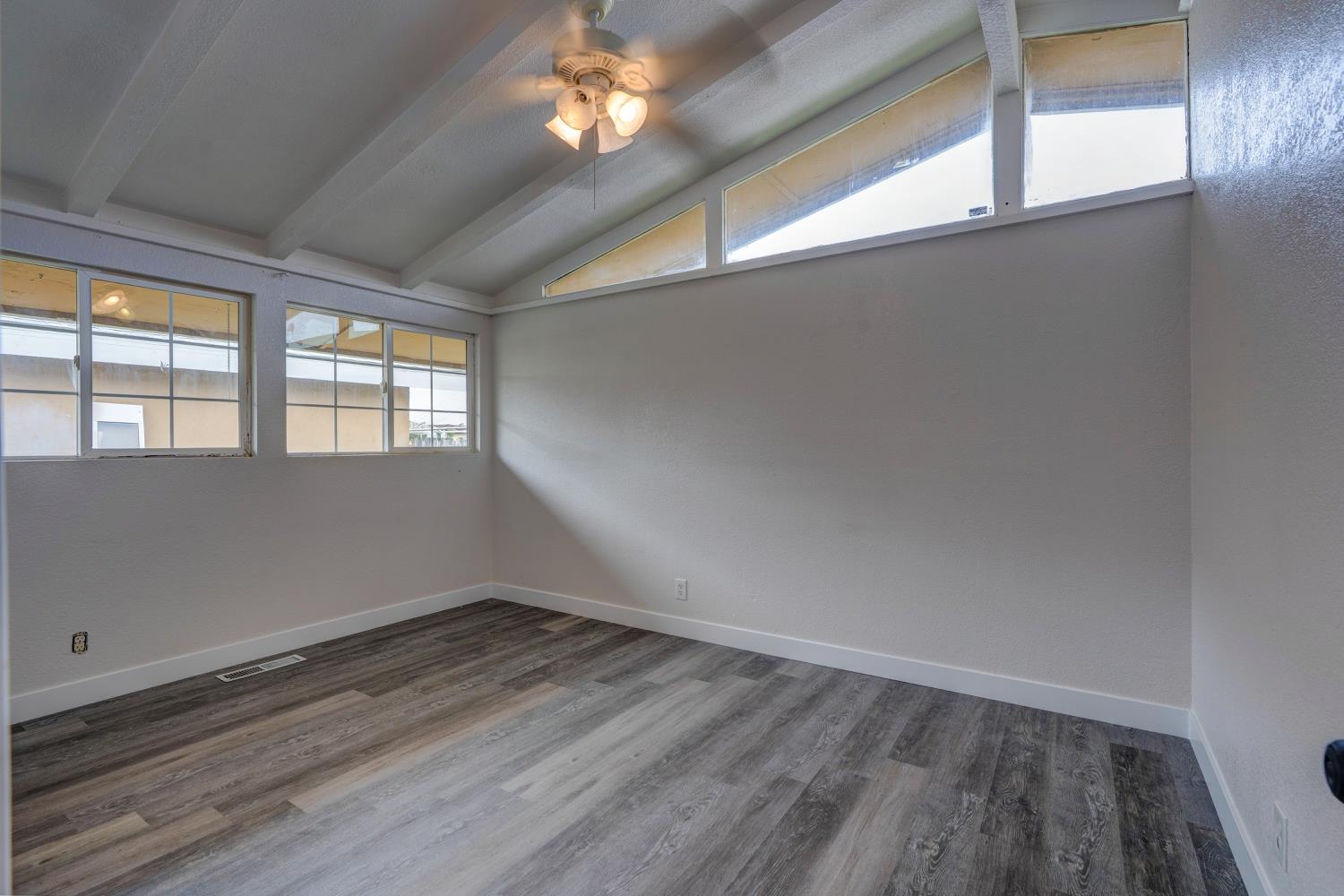 2310 Linden Street Atwater, CA 95301 - Photo 20 of 32 wooden floor in an empty room with a window