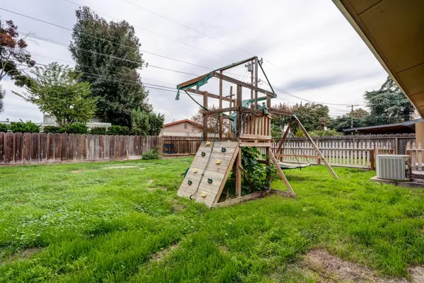 a view of a garden with a slide