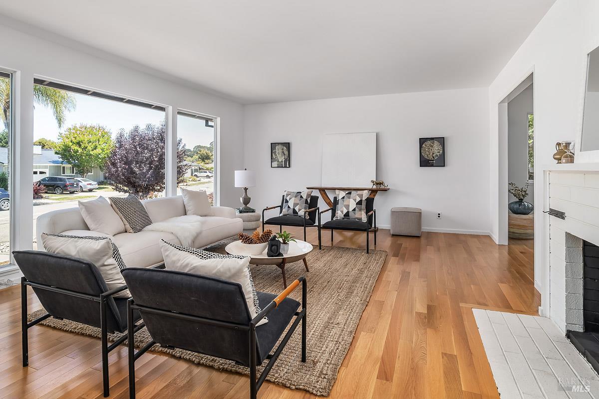 316 Riviera Drive San Rafael, CA 94901 - Photo 7 of 41 a living room with furniture and a wooden floor