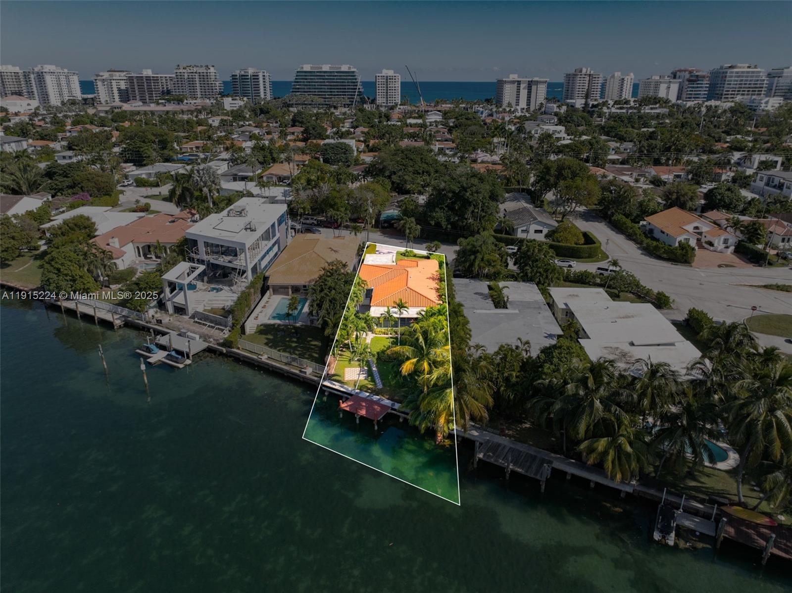 9316 Bay Drive Surfside, FL 33154 - Photo 4 of 8 an aerial view of residential house with outdoor space and river