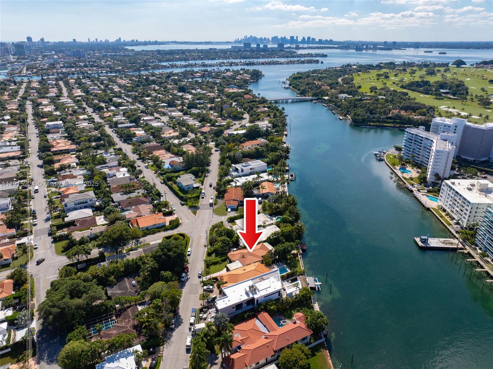 9316 Bay Drive Surfside, FL 33154 - Photo 7 of 8 an aerial view of residential houses with outdoor space
