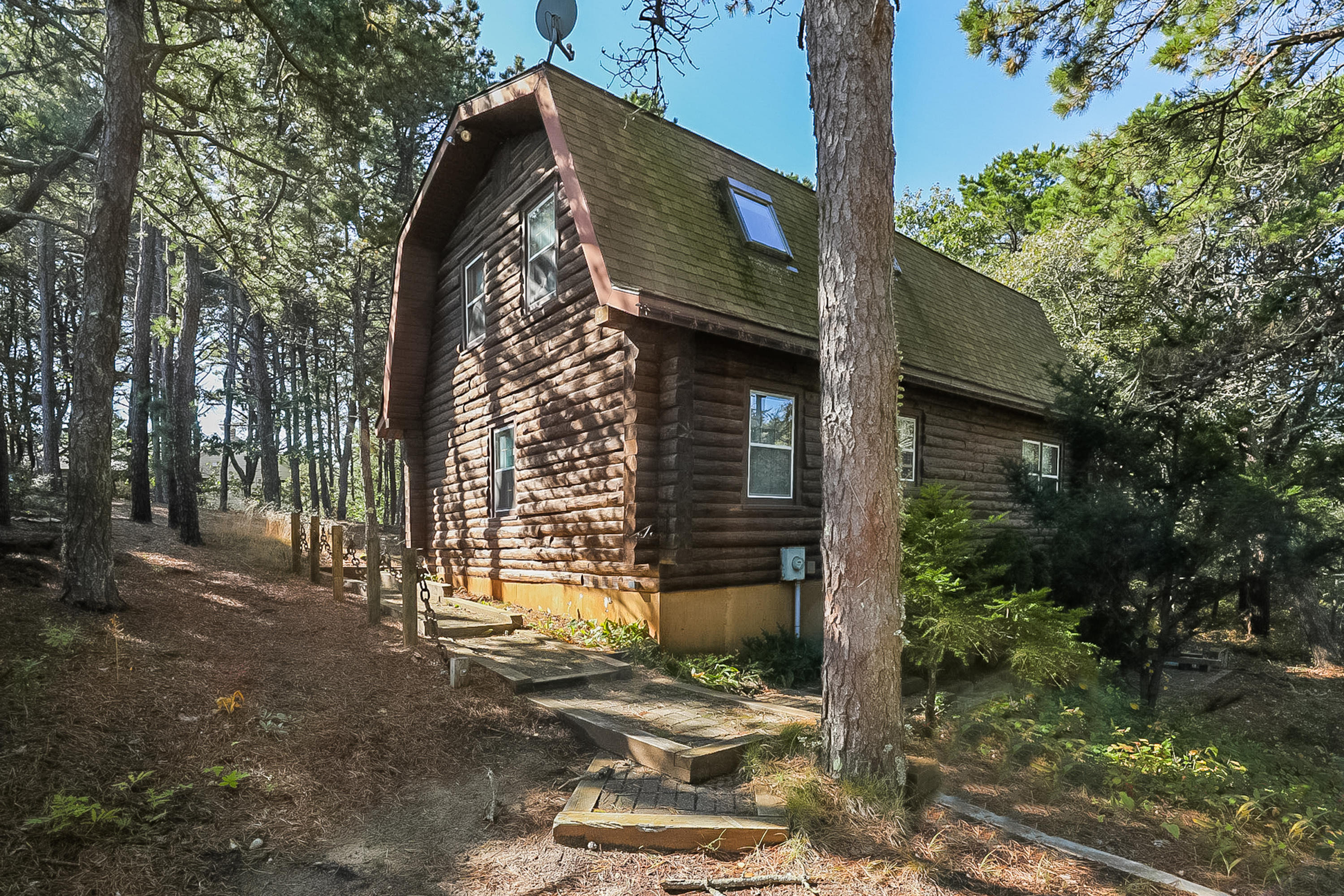 53 E Street Wellfleet, MA 02642 - Photo 2 of 41 a view of a house with a yard