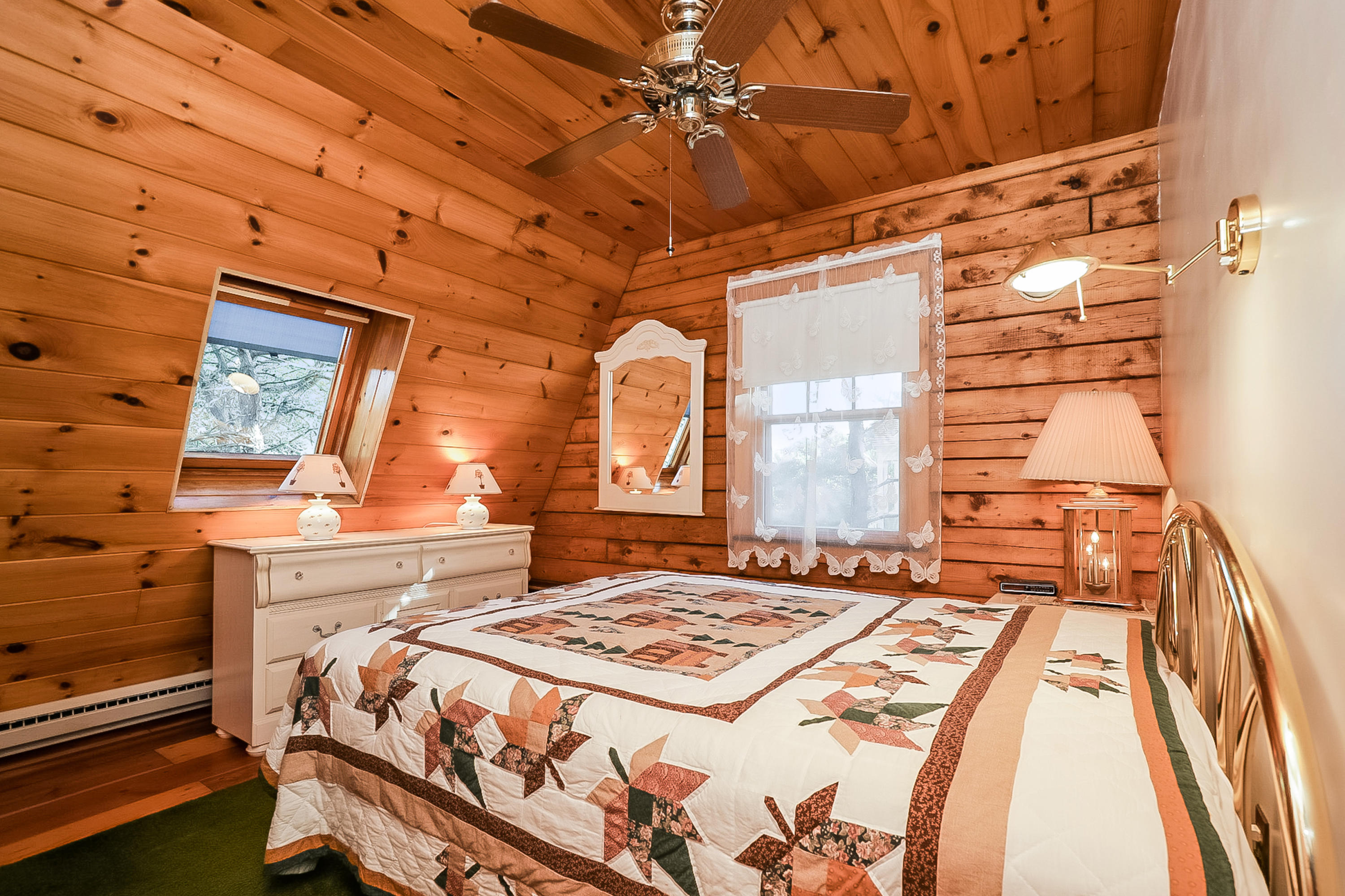 53 E Street Wellfleet, MA 02642 - Photo 22 of 41 a bedroom with a bed and a mirror