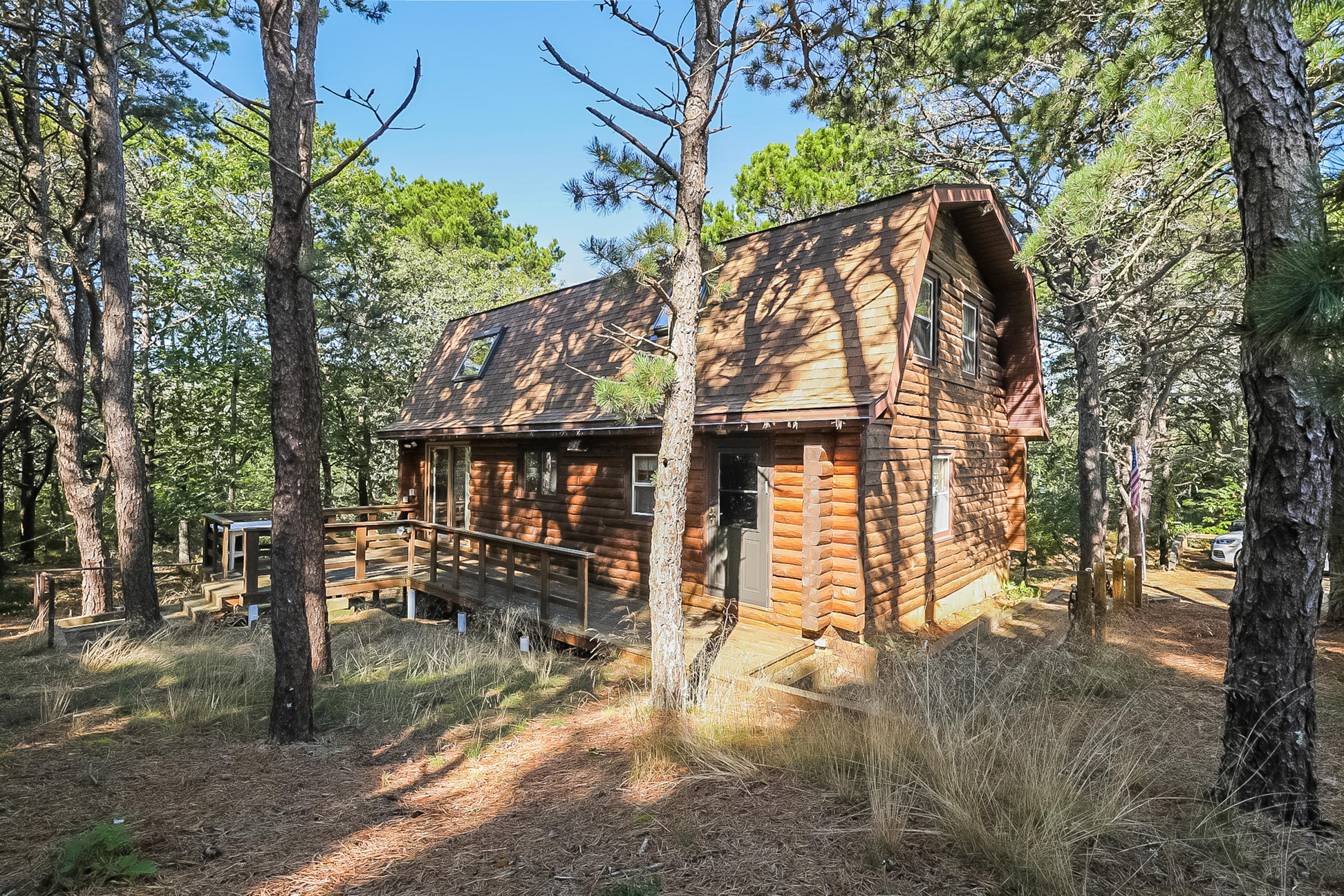 53 E Street Wellfleet, MA 02642 - Photo 35 of 41 a view of a house with a yard