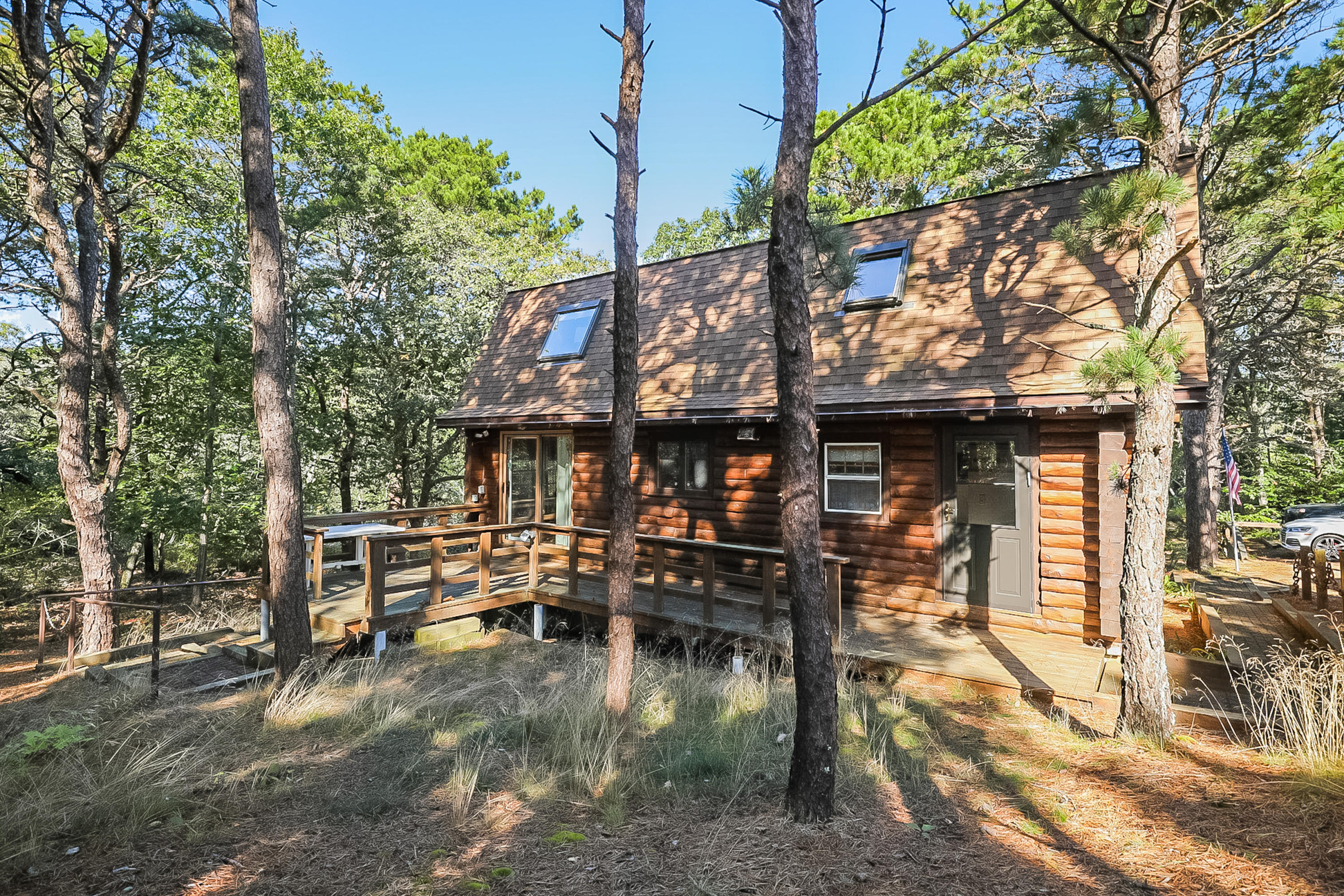 53 E Street Wellfleet, MA 02642 - Photo 38 of 41 a view of a swimming pool with outdoor seating