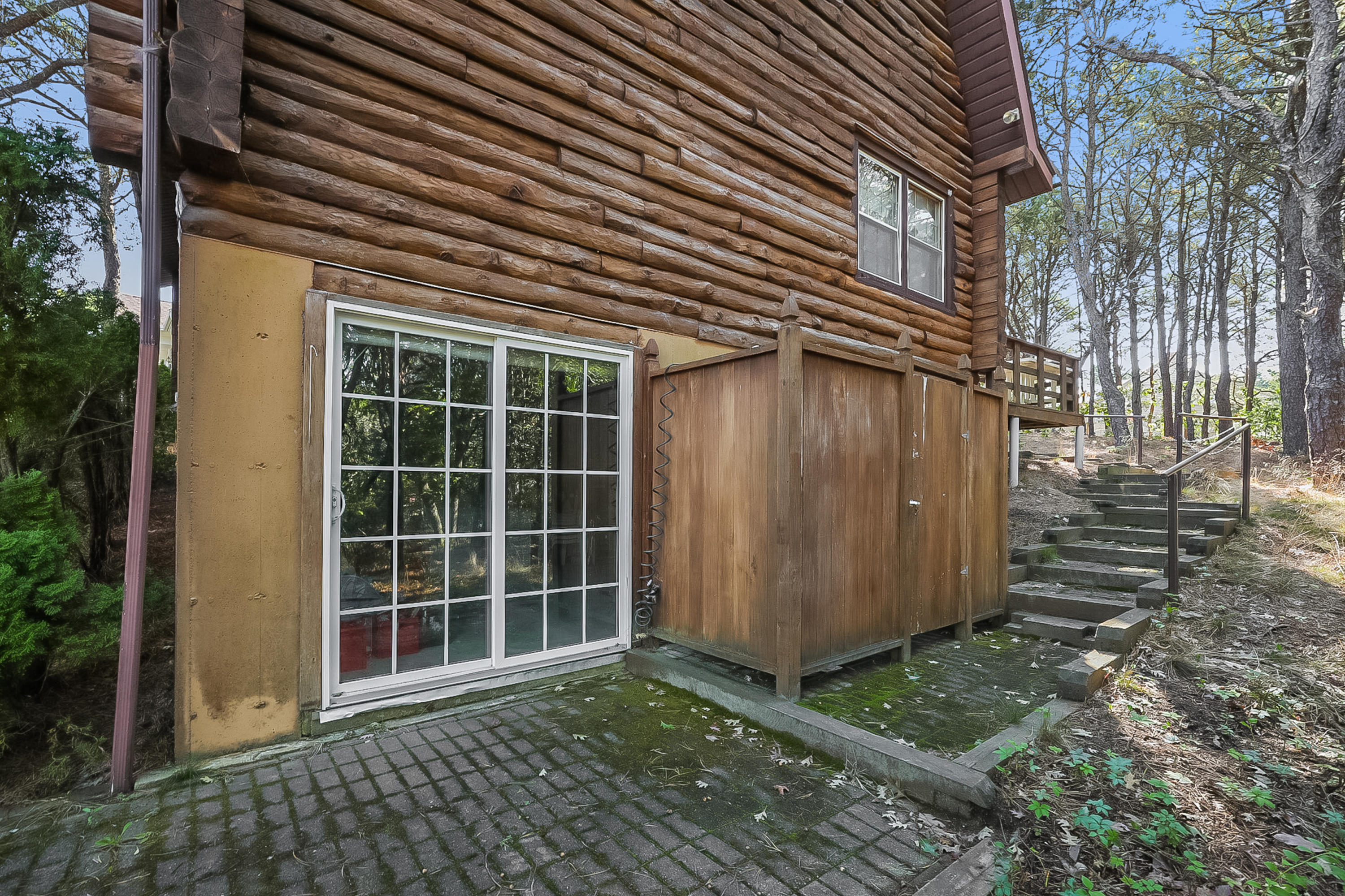 53 E Street Wellfleet, MA 02642 - Photo 39 of 41 a view of a house with a door and wooden walls