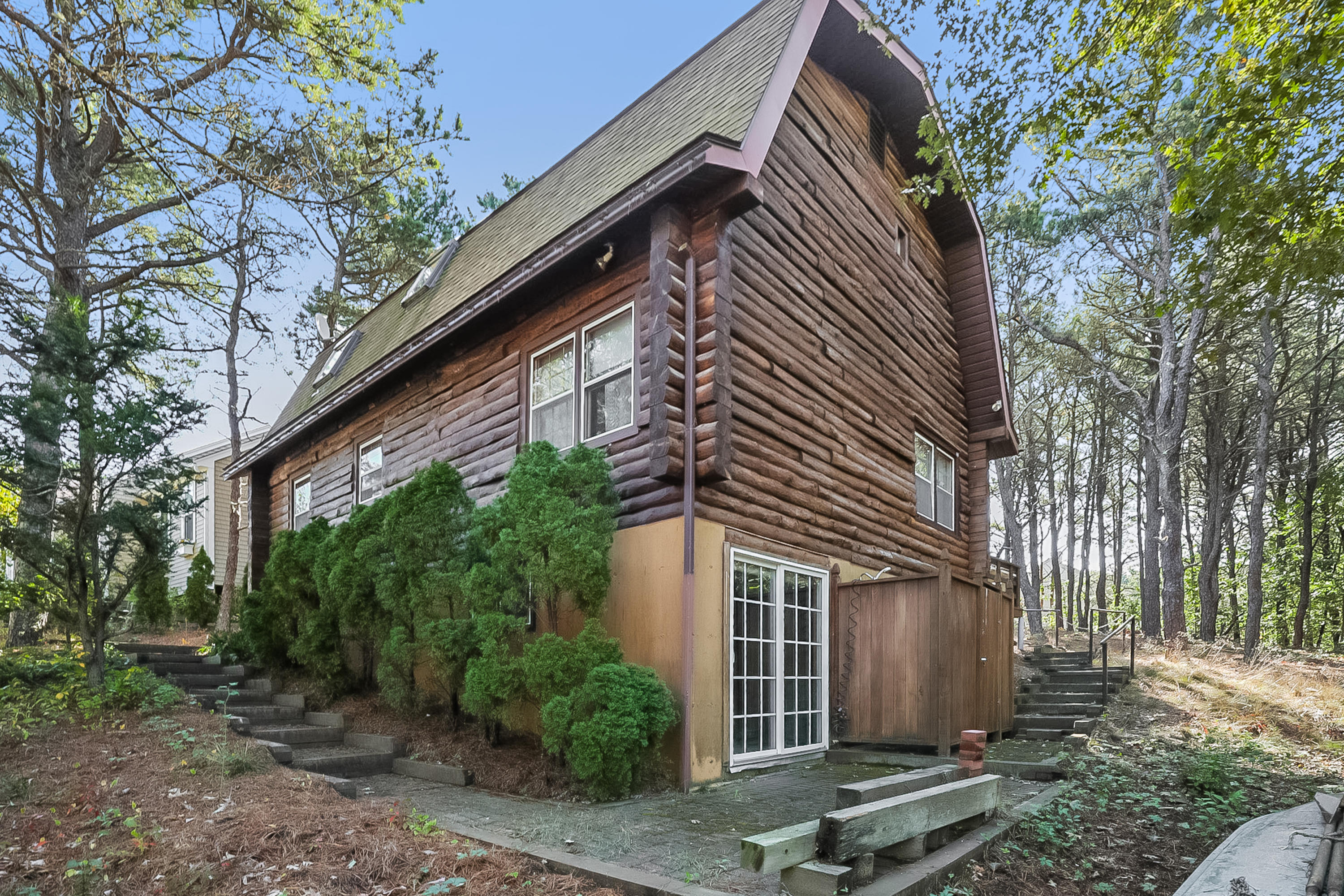 53 E Street Wellfleet, MA 02642 - Photo 4 of 41 a view of a house with a yard