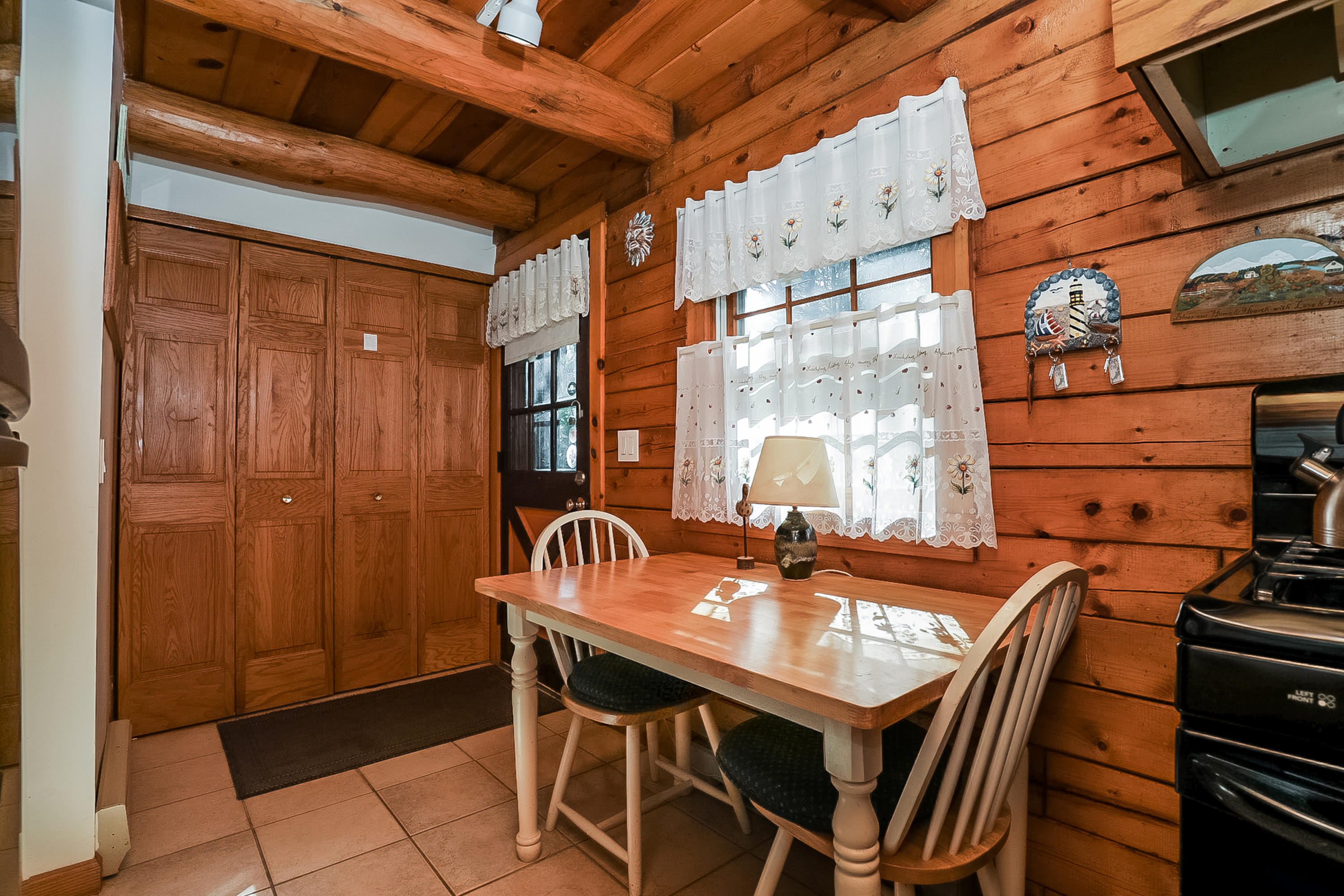 53 E Street Wellfleet, MA 02642 - Photo 7 of 41 a view of a patio with table and chairs