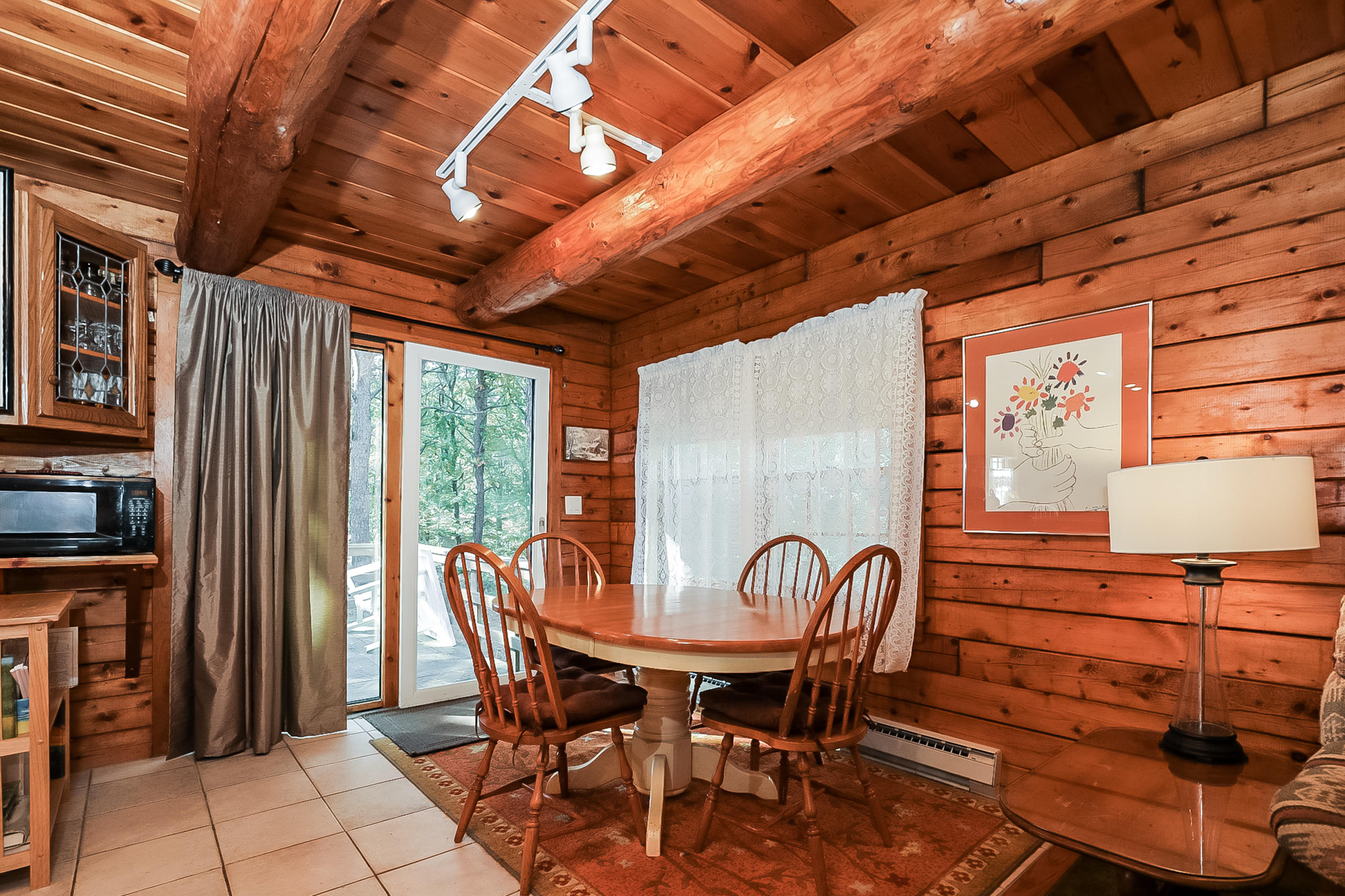 53 E Street Wellfleet, MA 02642 - Photo 9 of 41 a view of a dining room with furniture window and outside view
