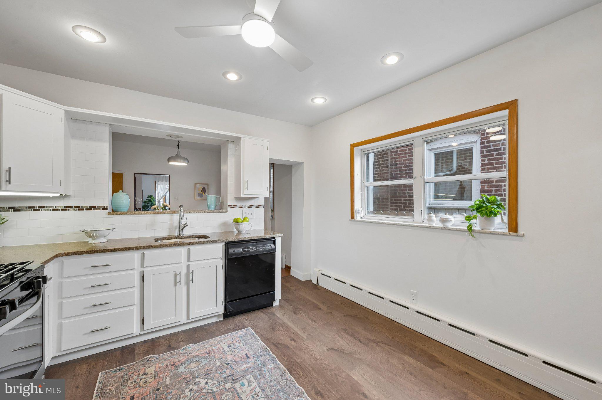 3346 Edgemont Street Philadelphia, PA 19134 - Photo 15 of 25 a large bathroom with a sink and a window