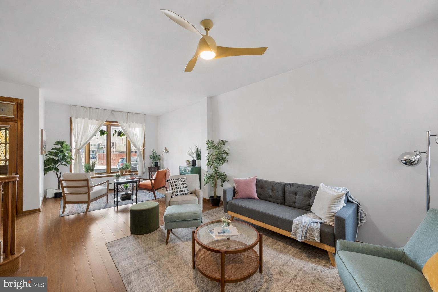 3346 Edgemont Street Philadelphia, PA 19134 - Photo 2 of 25 a living room with furniture and a large window