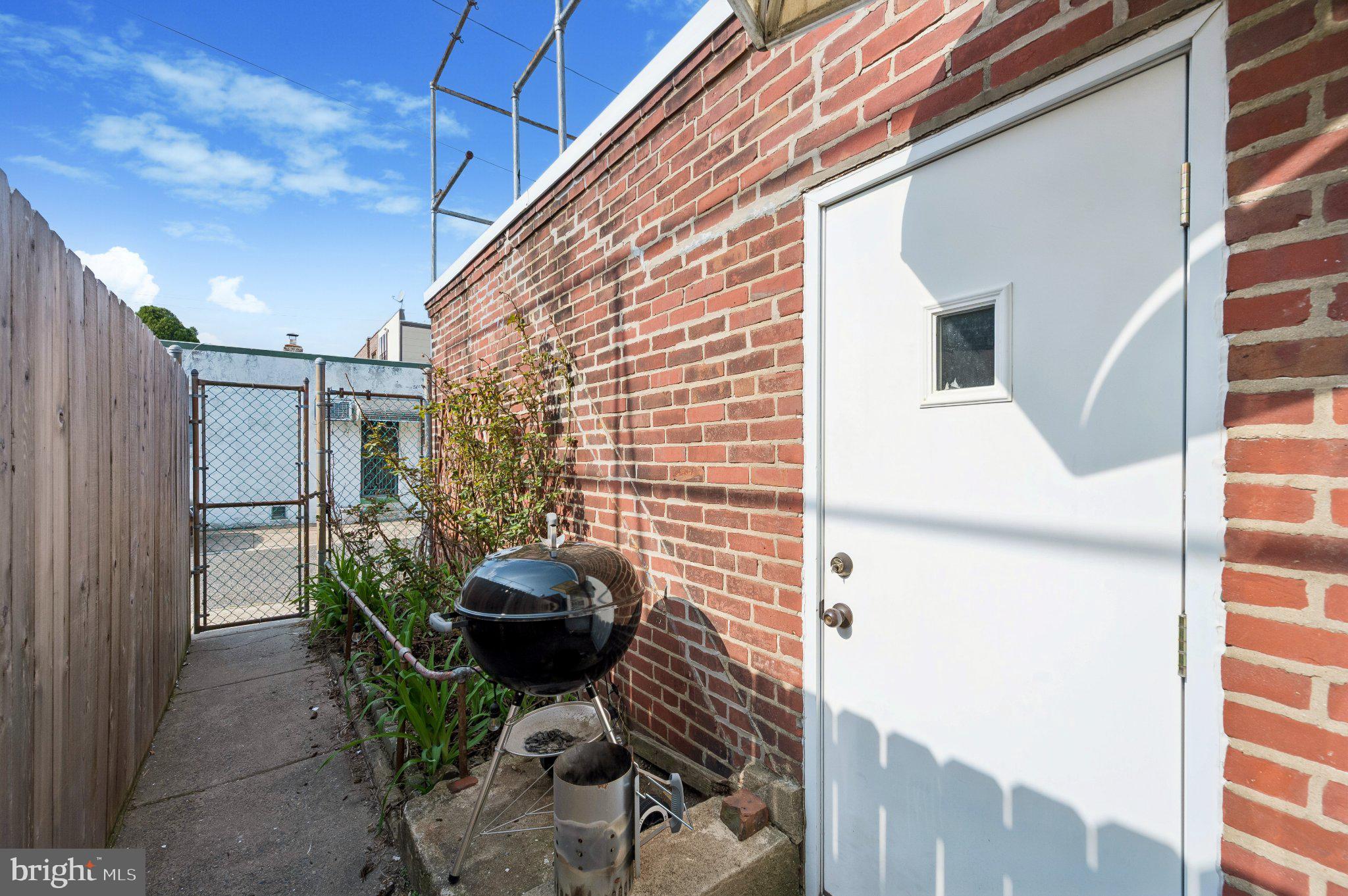 3346 Edgemont Street Philadelphia, PA 19134 - Photo 23 of 25 a backyard of a house with seating space